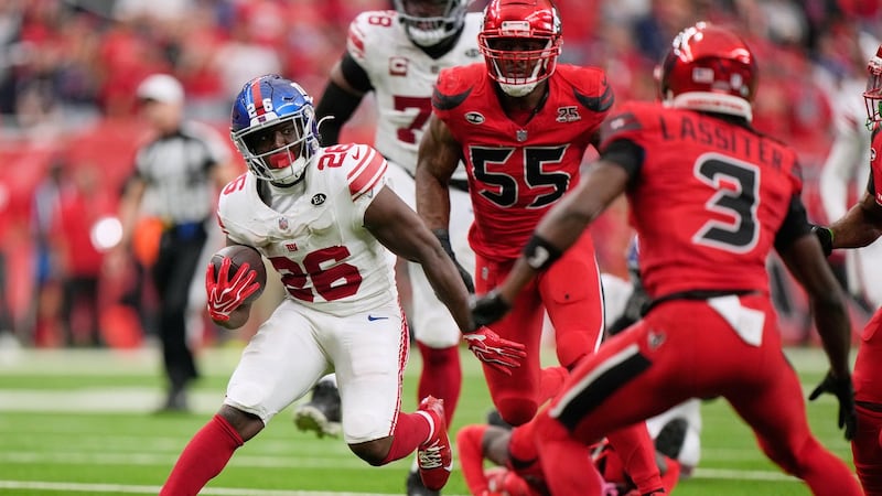 Singletary’s 30-yard run in OT gives Giants walk-off win over Texans