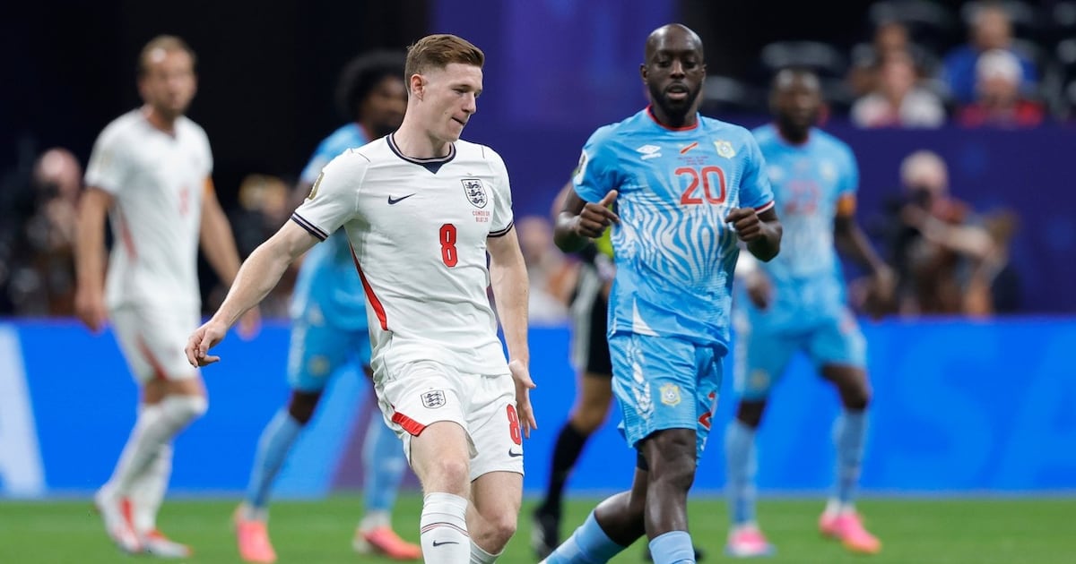Photo: tsn.ca England's Elliot Anderson (8) passes the ball ahead of Congo's Yoane Wissa (20) during the World Cup round of 32 soccer