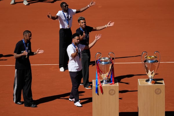 PSG stars bring Champions League trophy to Roland-Garros
