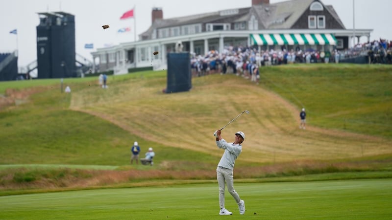 Russell, 17, has dad caddie to finish his U.S. Open debut in a Father’s Day surprise