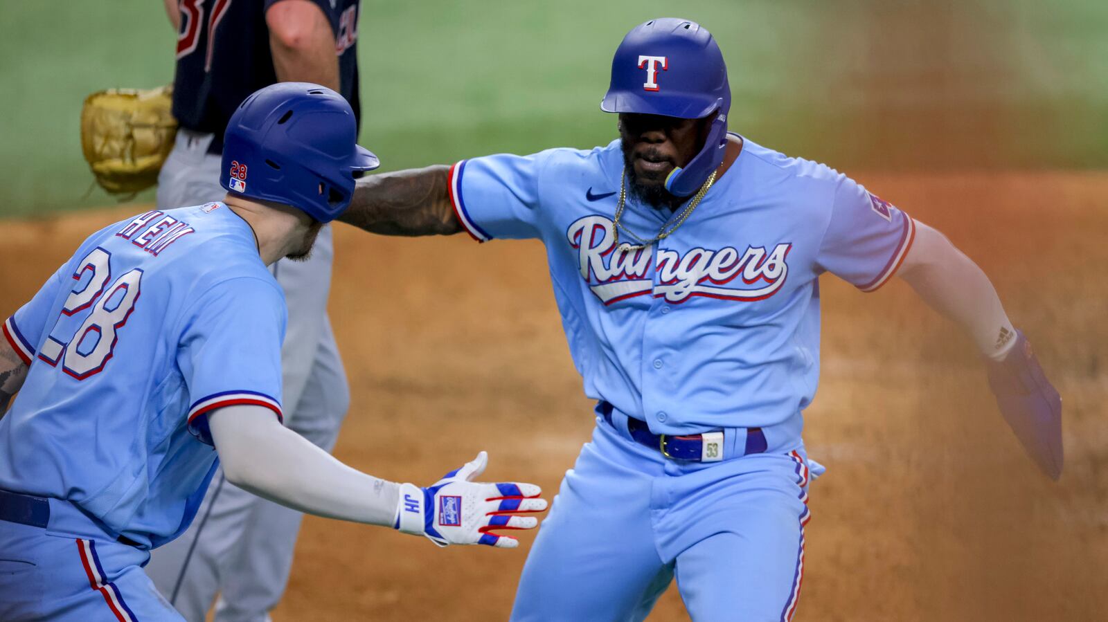 Texas Rangers rally to beat Cleveland Guardians and complete series sweep