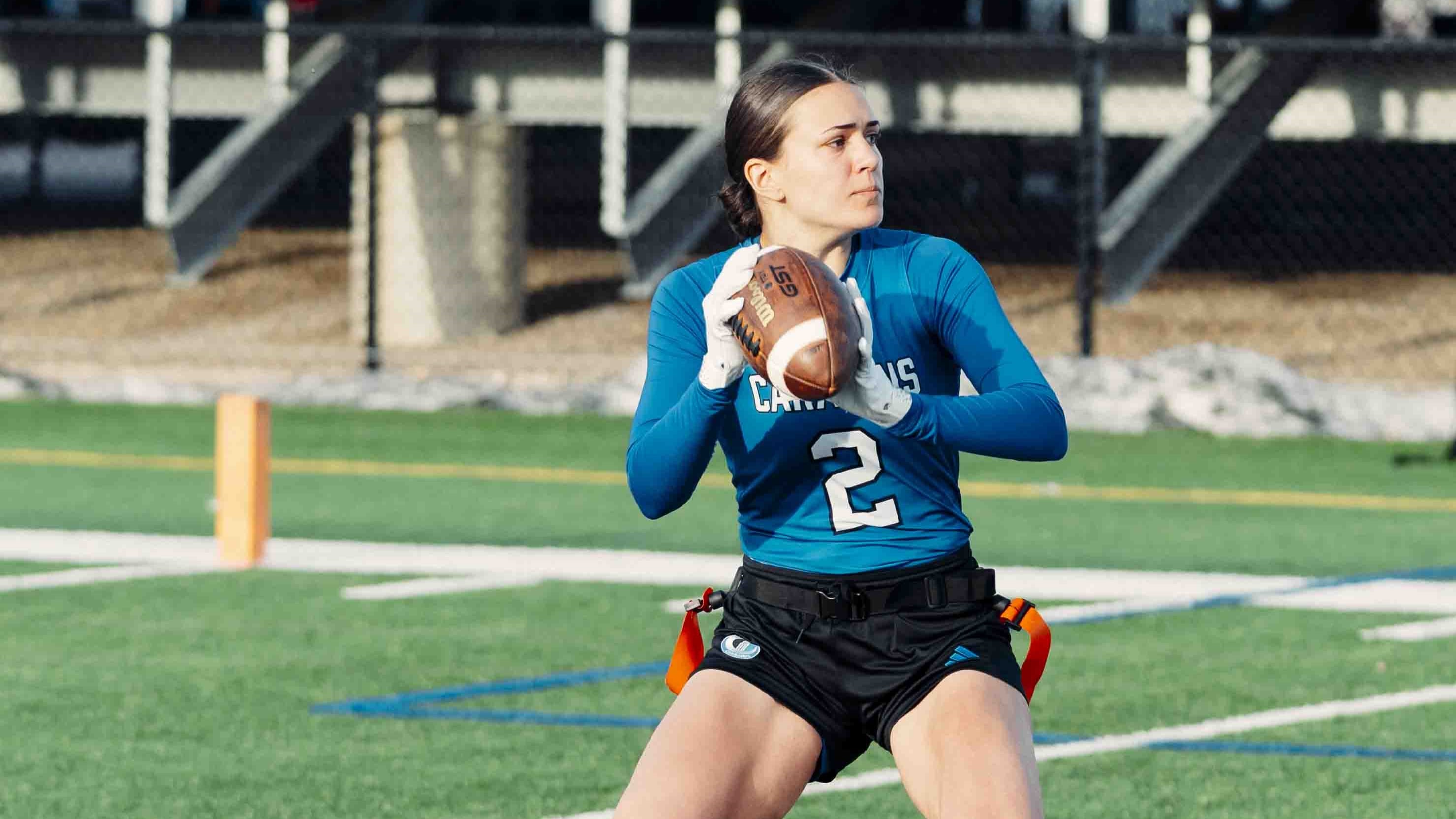 Woman playing flag football