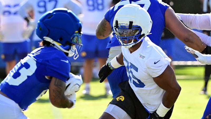 Rams’ Garrett misses practice again; Nacua exits early
