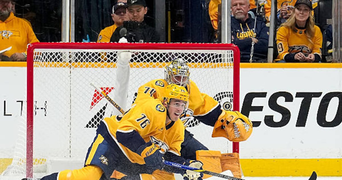 Photo: TSN NASHVILLE, TENNESSEE - OCTOBER 15: Brady Skjei #76 tries to clear a loose puck in front of Juuse Saros #74 of the Nashville
