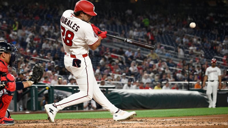 Morales homers, has 3 hits in debut as Nationals top Braves