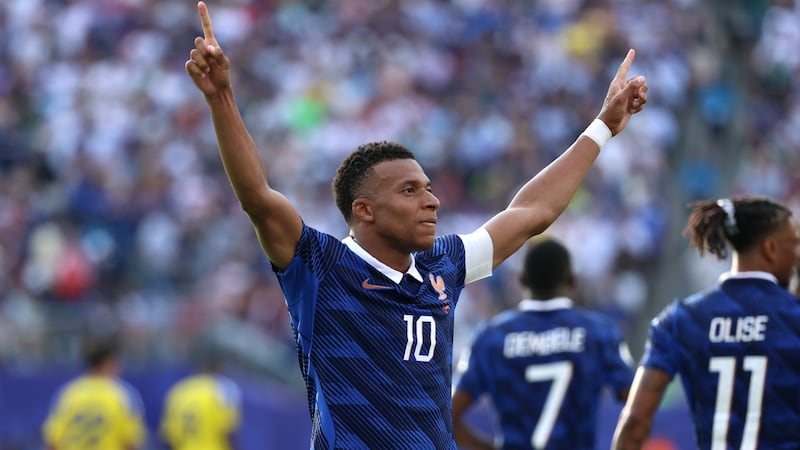 Mbappé scores twice to tie Messi for World Cup lead with six goals, France beats Sweden