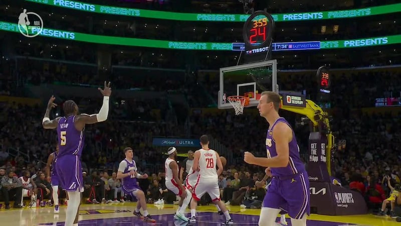 Austin Reaves drains near-logo three in return to action