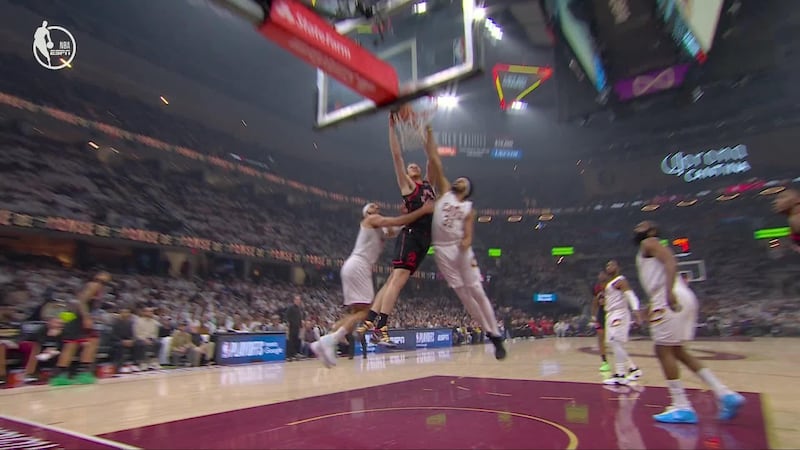 Jakob Poeltl rises for a massive poster slam