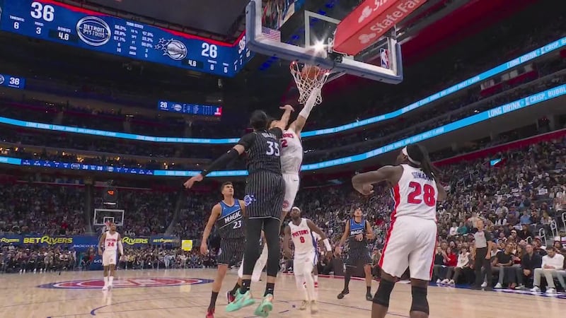 Cade Cunningham absorbs the bump for a Pistons putback