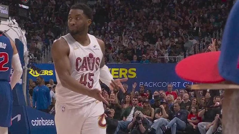 Donovan Mitchell hits his signature celebration after a slick jumper