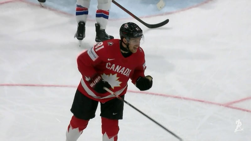 Holloway picks up his own rebound and scores on Cooley to make it 2-0 for Canada