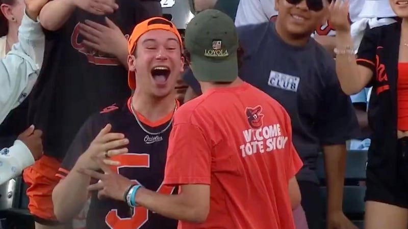Orioles fan can't believe it after catching two balls vs. Blue Jays