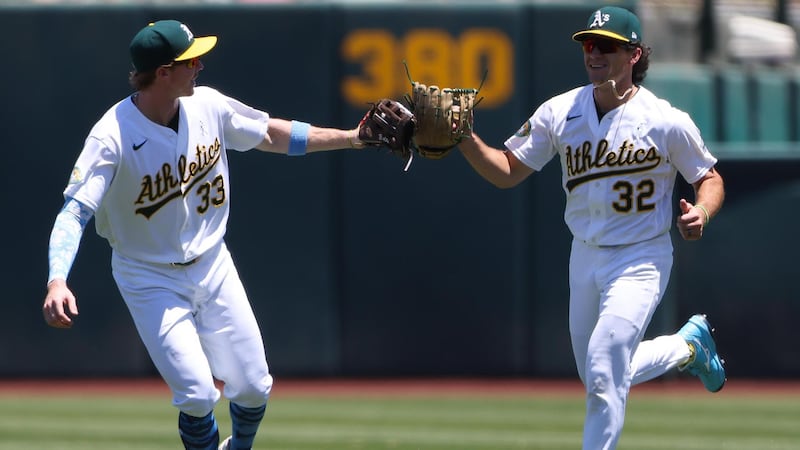 Colby Thomas makes a gutsy leaping grab for the Athletics