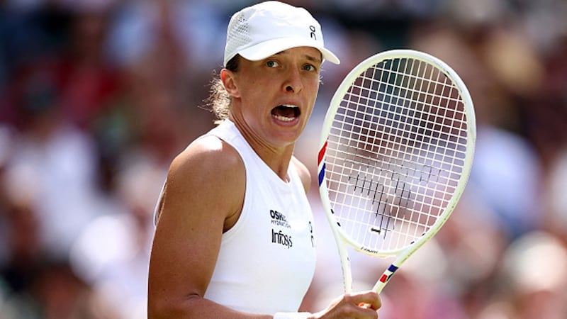 Defending champ Swiatek into second round at Wimbledon