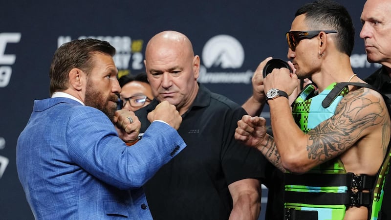 McGregor flings Holloway's sunglasses during intense stare-down