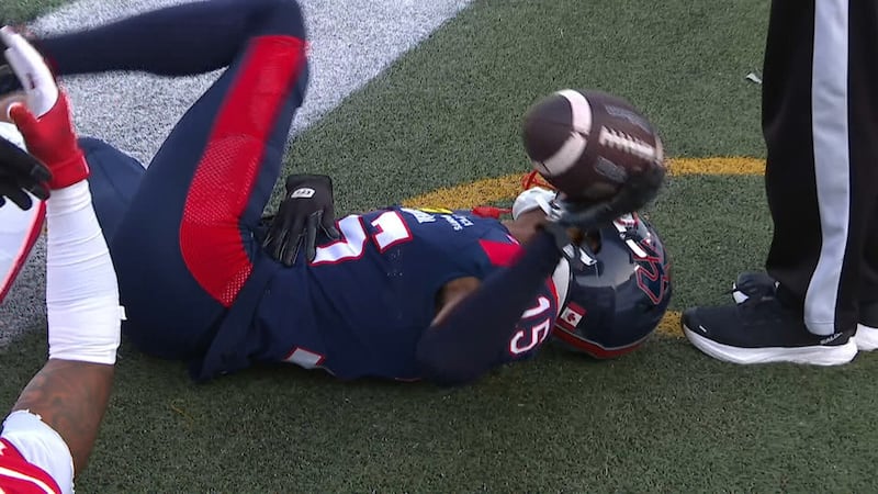 Hollins absorbs a huge hit as he converts catch-and-run touchdown