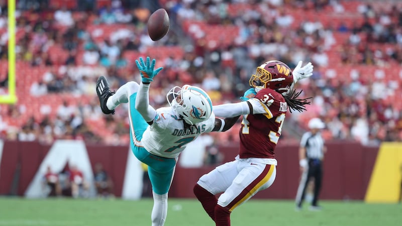 Must See: Douglas makes incredible one-handed catch for Dolphins despite DPI