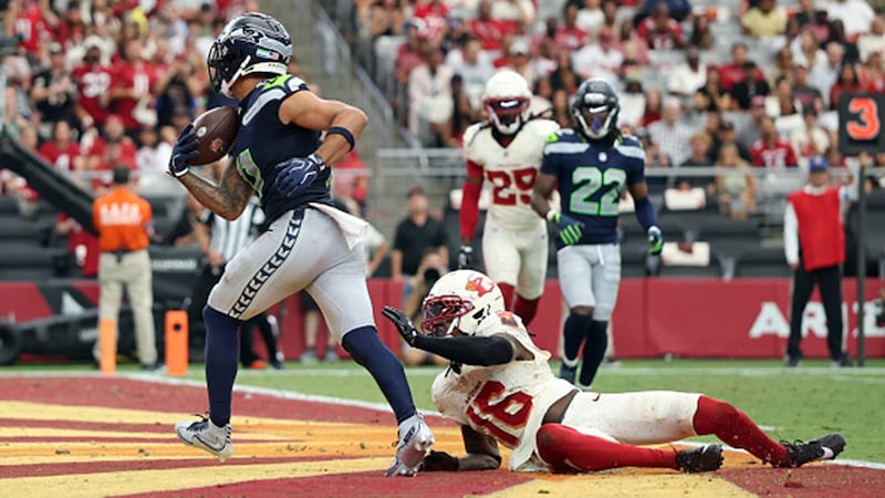 Smith-Njigba finds end zone three times as Seahawks rout Cardinals