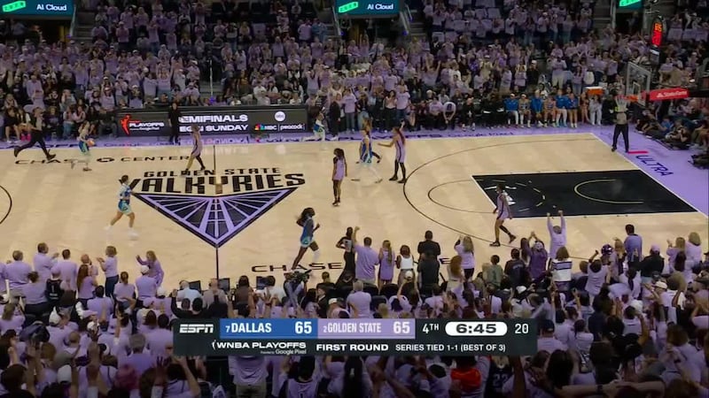 Kaila Charles swishes a big 3 for the Valkyries