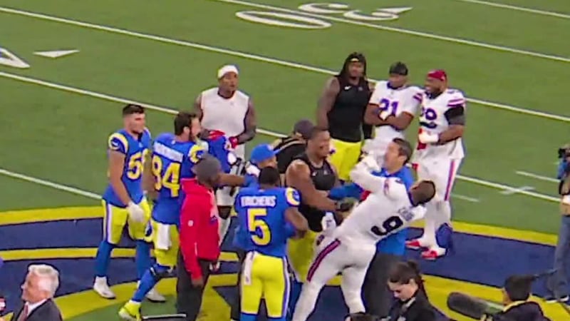 Alaric Jackson throws a punch at Bradley Chubb after Bills-Rams