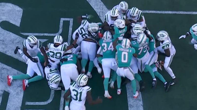 Dolphins surge forward on 4th down to seal 1st win of season
