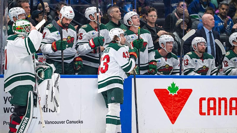 How did Quinn Hughes' return compare to Brady Tkachuk's?
