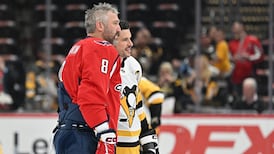 Must See: Fans get on their feet as Ovi and Crosby take the opening faceoff