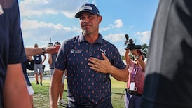 Woodland's emotional victory is one of the sports stories of the year