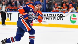 McDavid briefly leaves Game 2 with injury, held without a point in first two games 