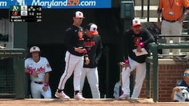 Orioles coach ejected, has to be held back from ump