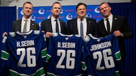 Canucks promote Johnson to GM; Sedin twins named co-presidents of hockey ops