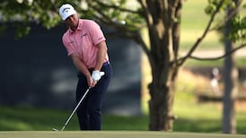 Max Greyserman rolls in a long eagle chip 