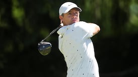 Rory McIlroy drives the green for birdie on Hole 6