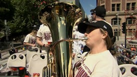 Boulier plays tuba at Victoire's championship parade, discusses newfound musical talent 