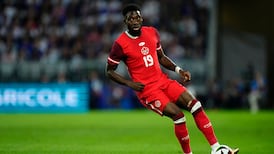 How important is it for Davies to suit up for Canada in friendlies before the World Cup? 