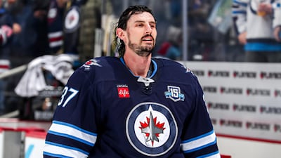 Hellebuyck goes public with trade request as training camp nears